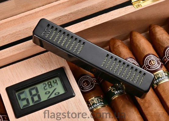 Order a cigar humidor with a hygrometer and humidifier built into the divider.